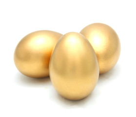 Golden egg isolated on white background