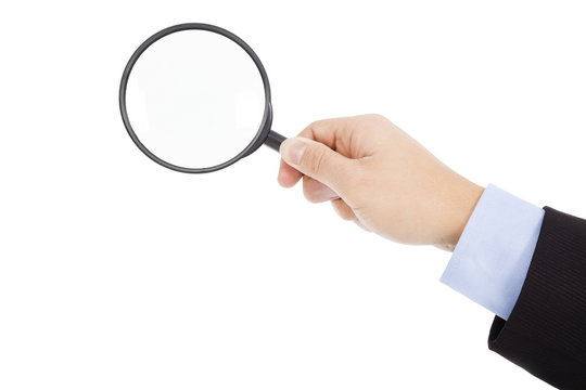 Hand Holding Magnifier Glass