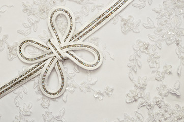 Wedding bow on white lace