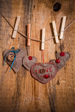Valentine background hand-sewn heart wood wooden