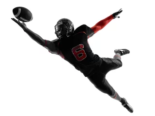 Foto op Aluminium american football player catching ball  silhouette © snaptitude