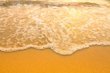 Fototapeta na wymiar Beach sand texture, soft wave of the sea.