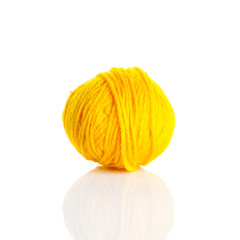 Ball of knitting yarn on a white background