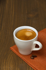 cup of espresso on a wooden table