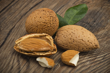 Almonds group close up on the wood table