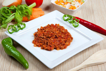 Ragout and vegetables in a dish