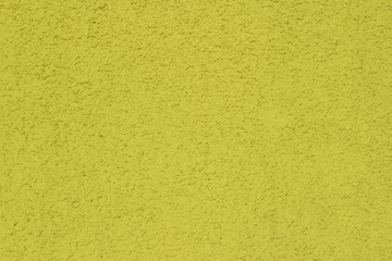 Fototapeta premium Grain yellow paint wall background or texture