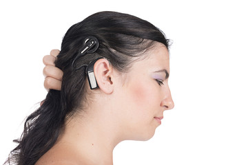 young deaf or hearing impaired woman with cochlear implant