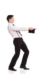 Something jumping out from magicans top hat.