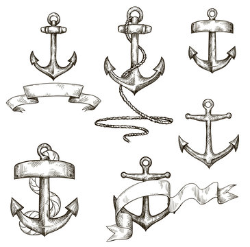 set of hand drawn anchors and ribbons