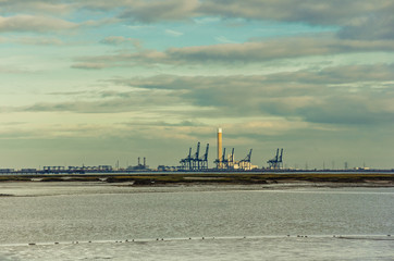Power Plant and Port Cranes at Sunset