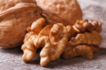 shelled walnuts and walnut in the shell macro