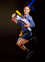 Builder woman with wallpaper.