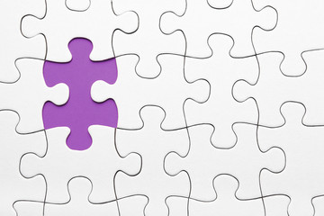 Fototapeta premium Lilafarbenes Puzzleteil