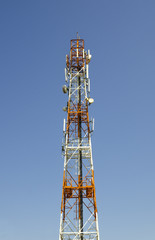 Communications tower with blue sky
