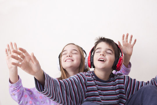 young guys listening music in the room
