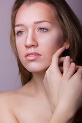 Studio beauty portrait of a beautiful young woman