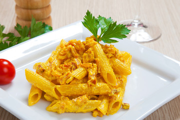 Penne with speck and saffron