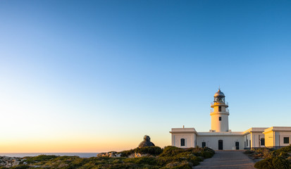 Fototapeta na wymiar Lighthouse at sunset