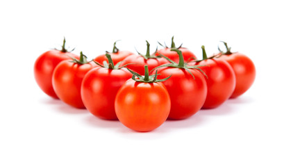 some red tomatoes on a white background