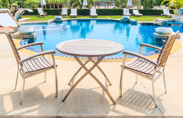 Table and chairs at the pool