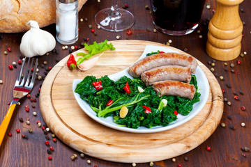 Sausages with vegetable garnish, cime di rapa