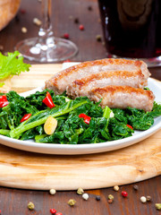 Sausages with vegetable garnish, cime di rapa