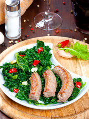 Sausages with vegetable garnish, cime di rapa