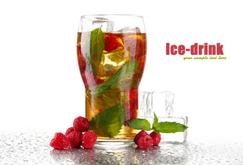 Iced tea with raspberries and mint isolated on white