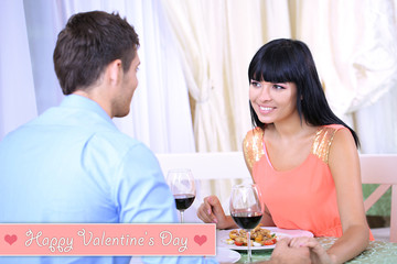 Beautiful couple having  romantic dinner at restaurant