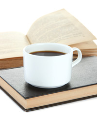 Cup of coffee and books isolated on white