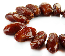 Dried dates isolated on white
