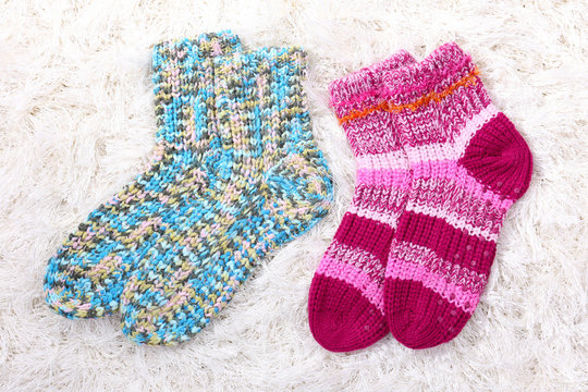 Woolen socks, on color background