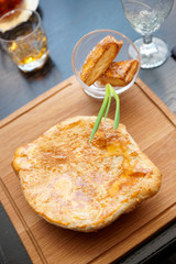 Meat pie on table in pub