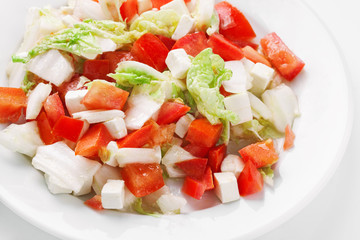fresh vegetable salad with feta cheese and tomatoes