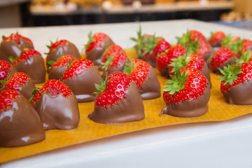 Strawberries Coated In Melted Brown Chocolate