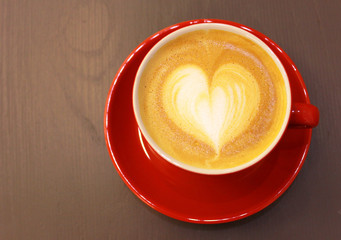 Cappuccino or latte coffee with heart shape