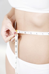 Measuring woman's waist
