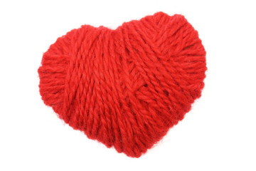 Yarn of wool in heart shape symbol