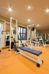 Interior view of a gym with equipment.