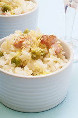 lemon rice with bacon and peas in a cup