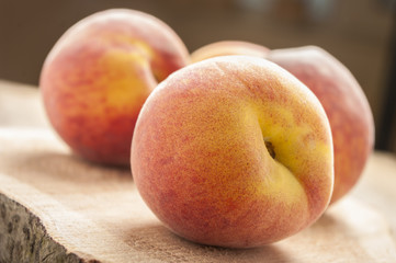 peaches in wooden background