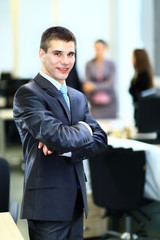 Portrait of mature business man smiling during meeting with