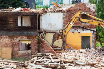 House demolition with excavator