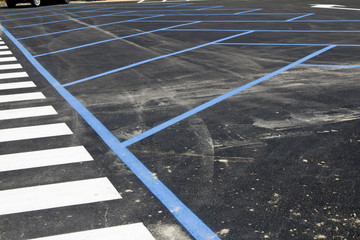 Crosswalk and parking place with road marking