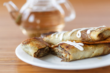 pancakes stuffed with mushrooms and cabbage