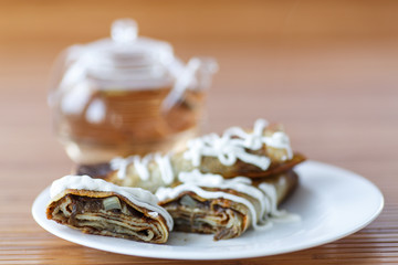 pancakes stuffed with mushrooms and cabbage