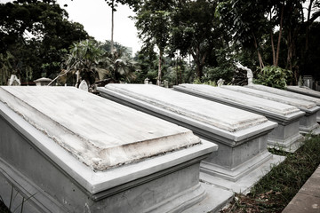Tombstones in very old cemetery Museum Prasasti
