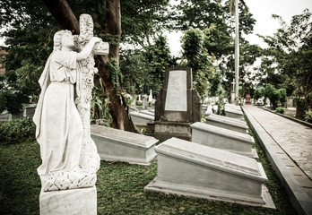Fototapeta premium Statue in old cemetery Museum Prasasti