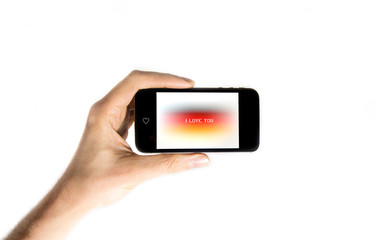 Male Hand Holding a Smart Phone with an I Love you Love Message